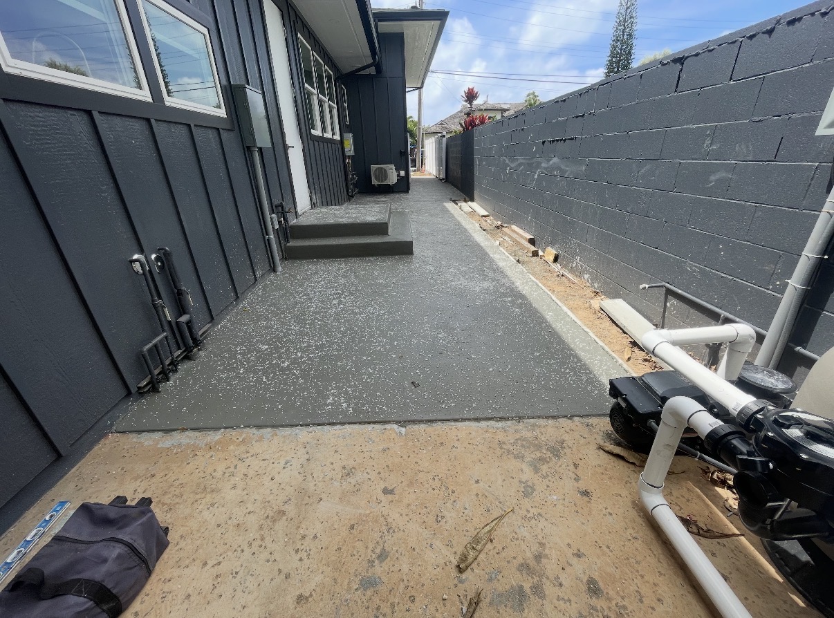 Placed concrete side walkway and entry steps