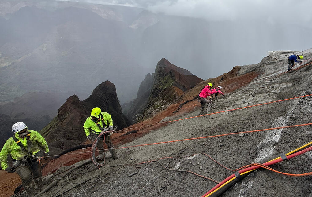 Shotcrete crew working on a steep slope at Waimea Canyon